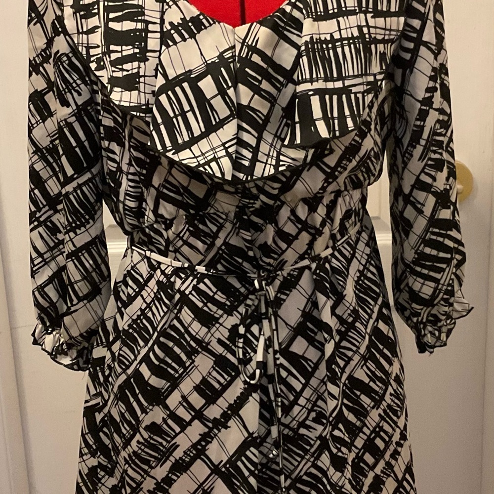 Black and cream ruffled mini dress